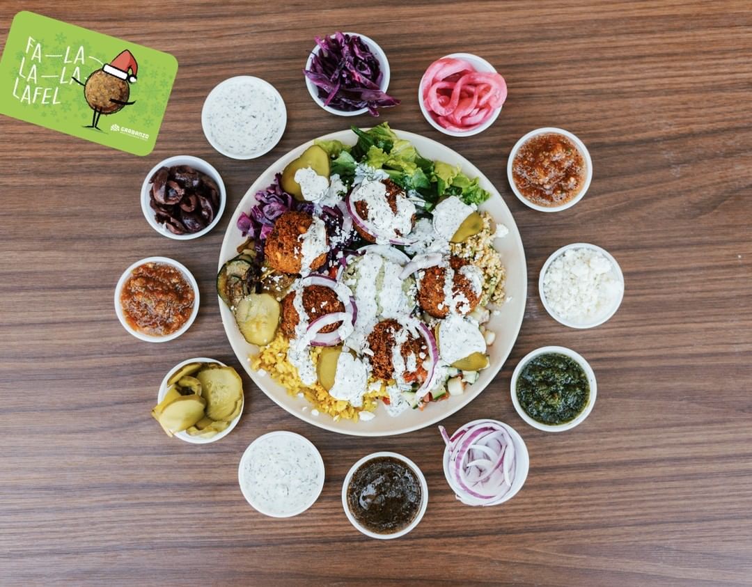eatgarbanzo's tweet photo. When food looks this good and tastes just as remarkable … it’s worth sharing! In the season of giving, get a free entree for yourself every time you spend $30 on GARBANZO gift cards for others! 

#Holidays #HolidaySpecial #GiftCards #SeasonOfGiving #Christmas #FeelBrighter https://t.co/CTnNA8gZ7i