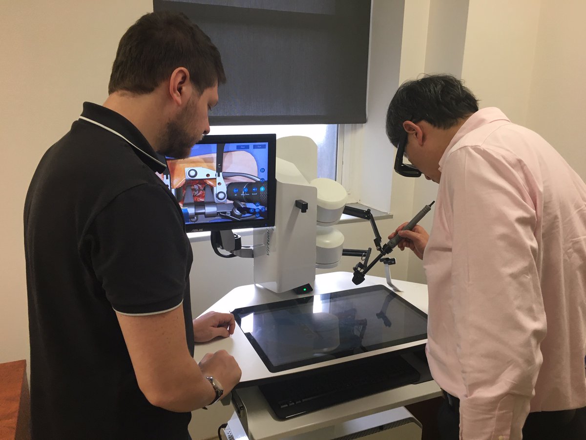 RFDelMaestro's tweet photo. @AI_SimCentre welcomed Dr. Zhou Dabiao and his wife from Beijing Tiantan Hospital. Lots of virtual reality brain and spine surgery powered by AI to experience. https://t.co/Vy2H5mmgNu