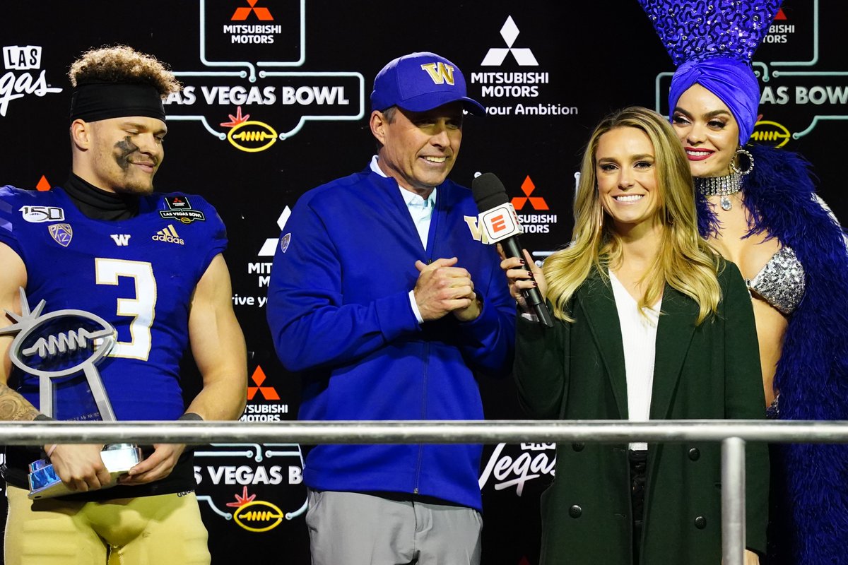 LasVegasBowl's tweet photo. Postgame Celebration 📸
@UW_Football's Head Coach Chris Petersen, Defensive Coordinator Jimmy Lake & players celebrate receiving the Rossi T. Ralenkotter #MMLVBowl Championship Trophy from @mitsucars CMO Kimberley Gardiner! Elijah Molden (No. 3) was named the Rich Abajian MVP! https://t.co/r4J22WHeW4