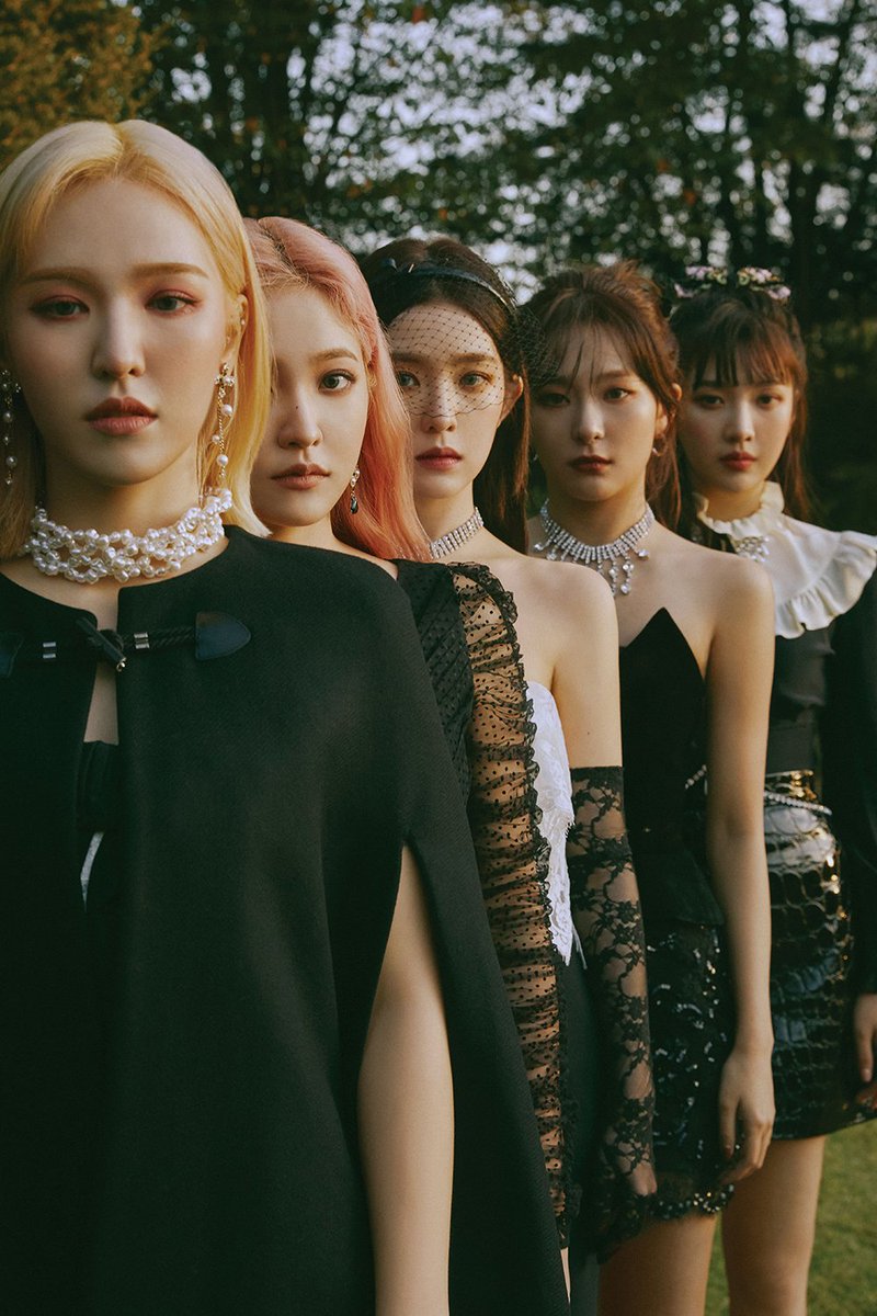 96. The only members that wears white are the most powerful members in the cult. While the two rebels are the only members with both earrings and a necklace.