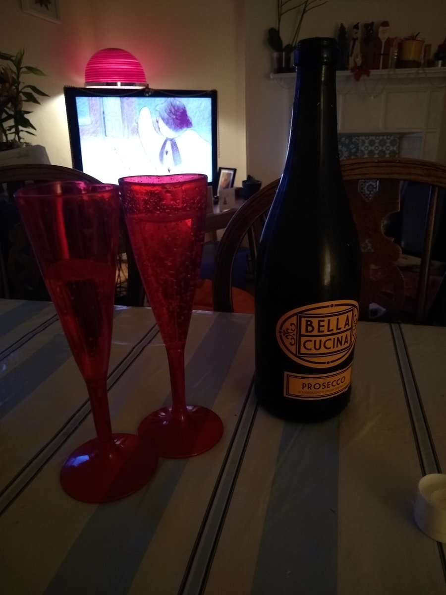 EmilyLucyBrowne's tweet photo. @AlisonBevanRWA thanks again for the prosecco! Enjoying with Ashley on our fake Christmas Day (spend the real one with parents) in front of 'The Snowman' - very festive 😊😁 also check out those poundland plastic glasses. So classy. https://t.co/OyuwqmSChK