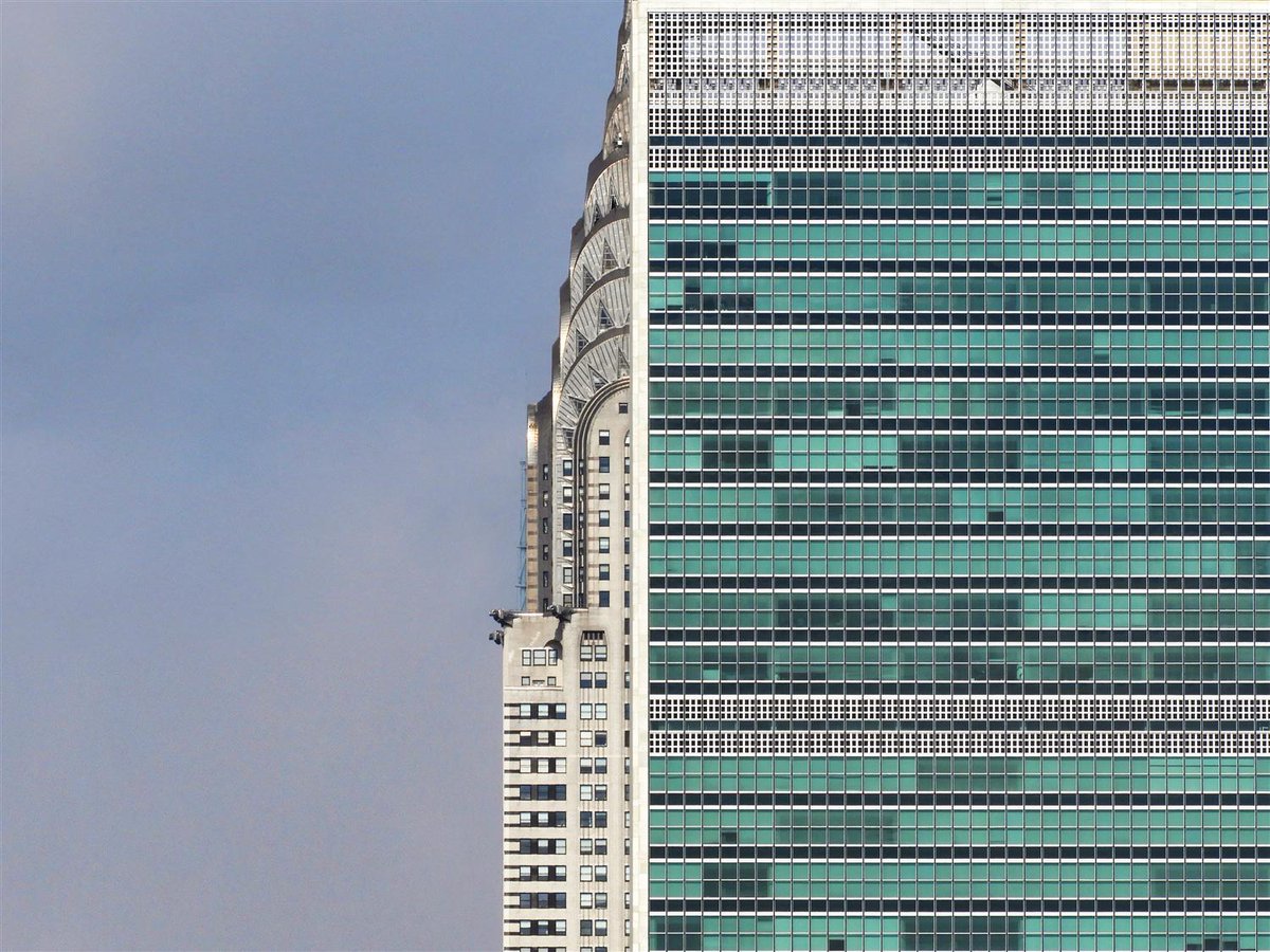 this new york city photograph no longer exists. lining up the united nations and the chrysler buildings the same way right now down 42nd street would find a new highrise in the background.