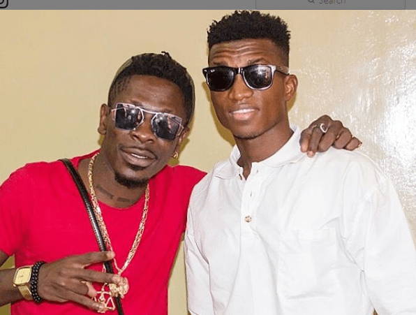 RealHitz360's tweet photo. Video: Shatta Wale could not handle Kofi Kinaata’s bars; ‘collapses’ on stage! #madeintaadi19 https://t.co/MYYrT0mr14 https://t.co/mUX5BiZQYk