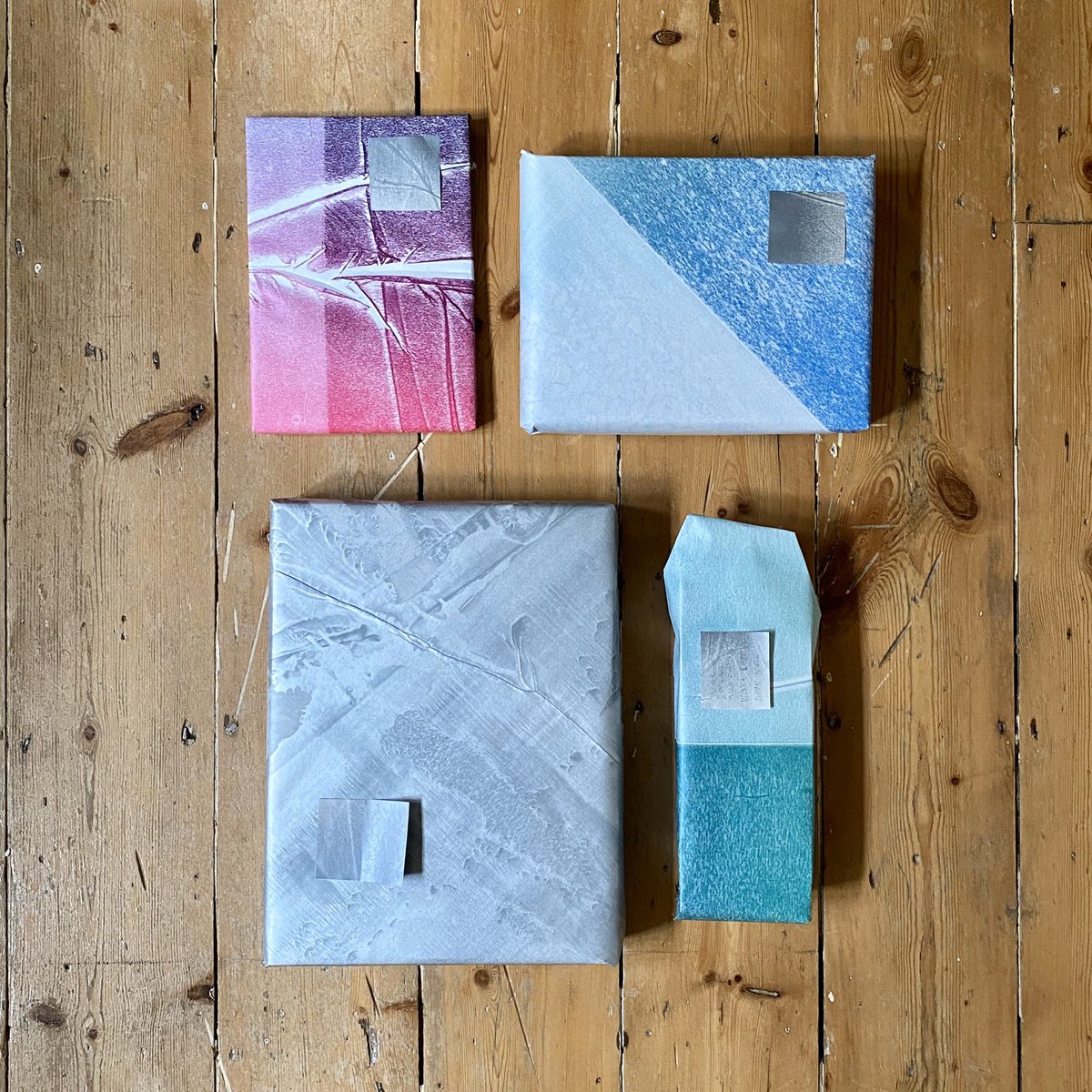 Newsprint used to clean the ink from the rollers, recycled as wrapping paper.