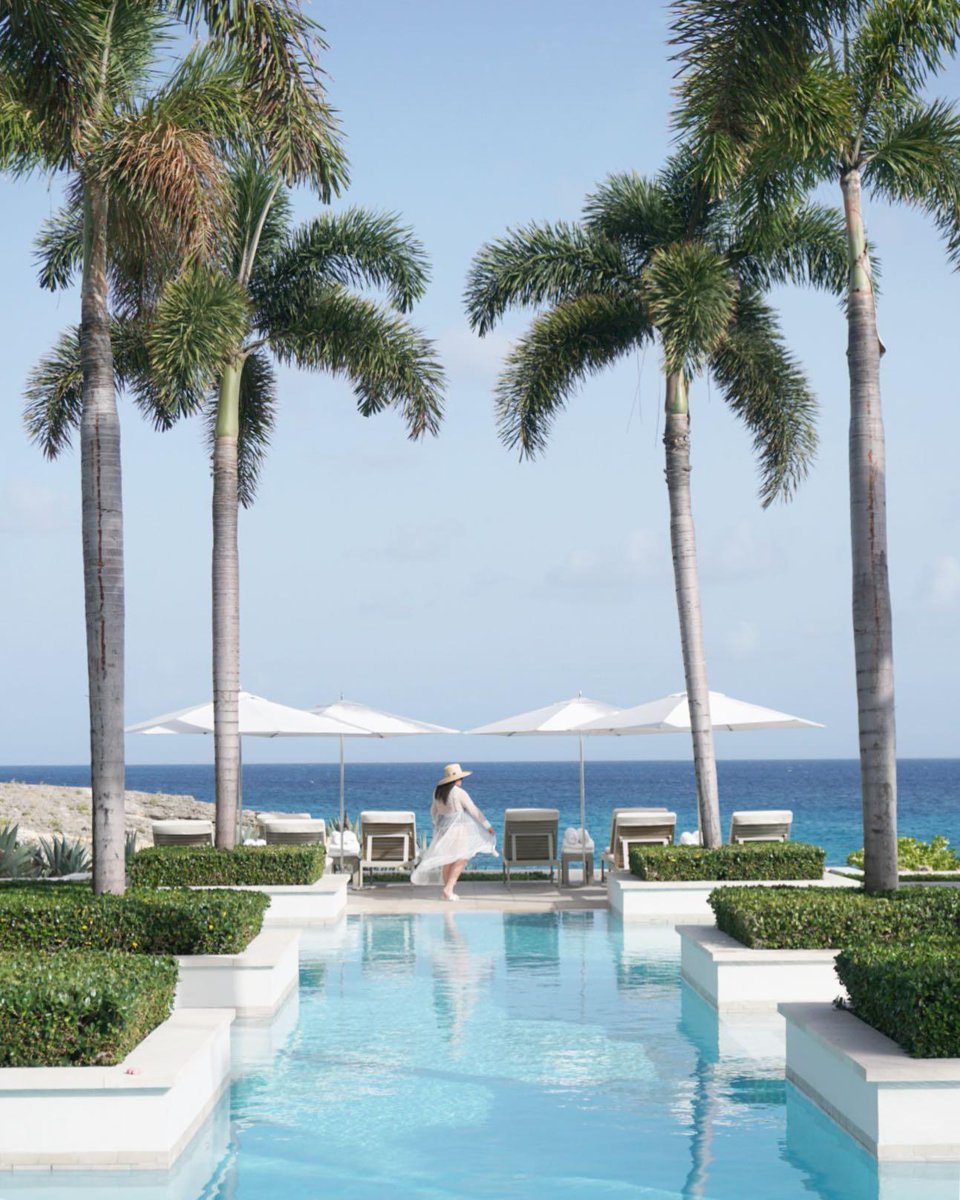 Overlooking Meads Bay, the architecturally stunning Aleta pool has amazing views of the Caribbean Sea and luxurious cabanas for your enjoyment.

📸: <a href="/KCYouThere/">KC You There</a> 

#FSAnguilla #WinterInAnguilla #PoolView