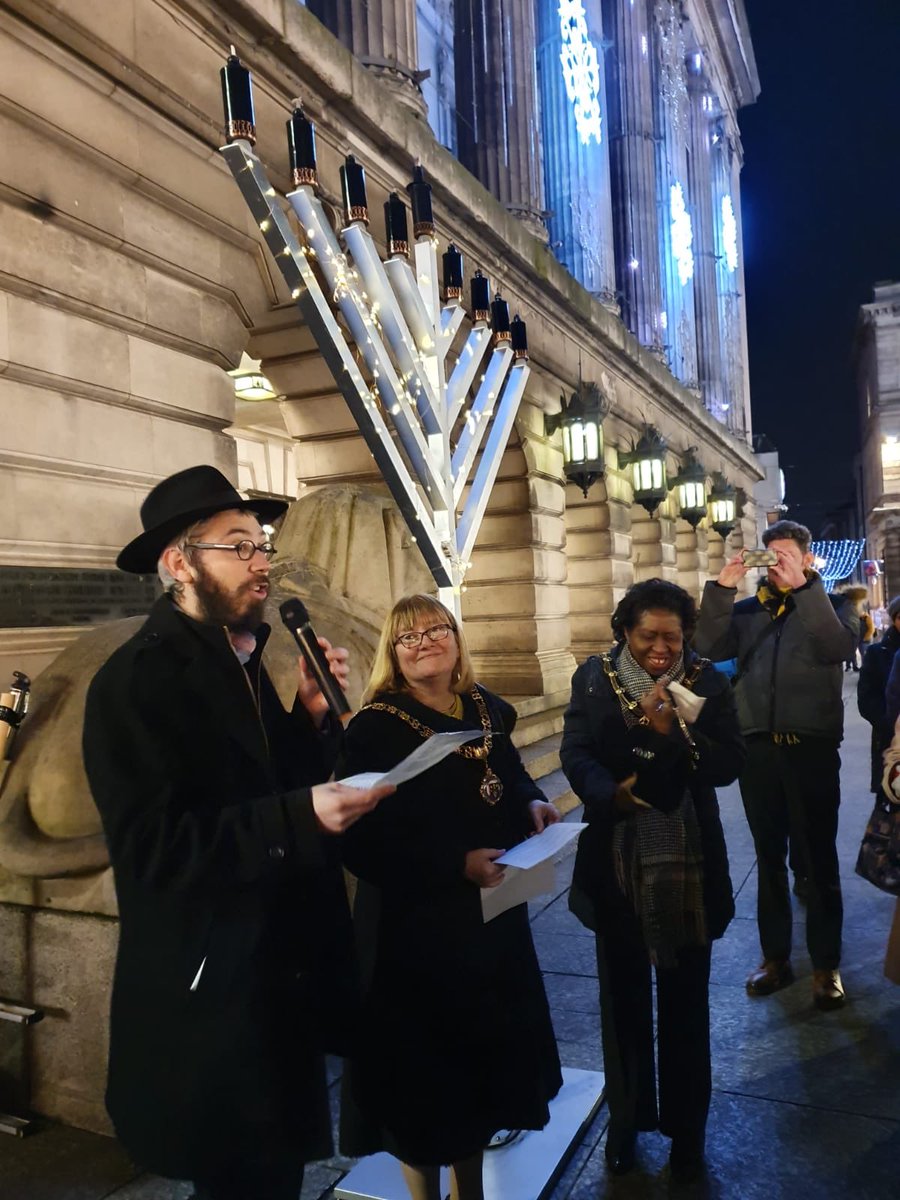 NottsChabad's tweet photo. Lighting the #Chanukah Menorah tonight in Market Square with @LordMayorNottm and @SheriffNottm and a fantastic crowd of over 100 people. A single flame can light an infinite number of flames. #LightASoul #ShareTheLights https://t.co/3YEh2Vr2sr