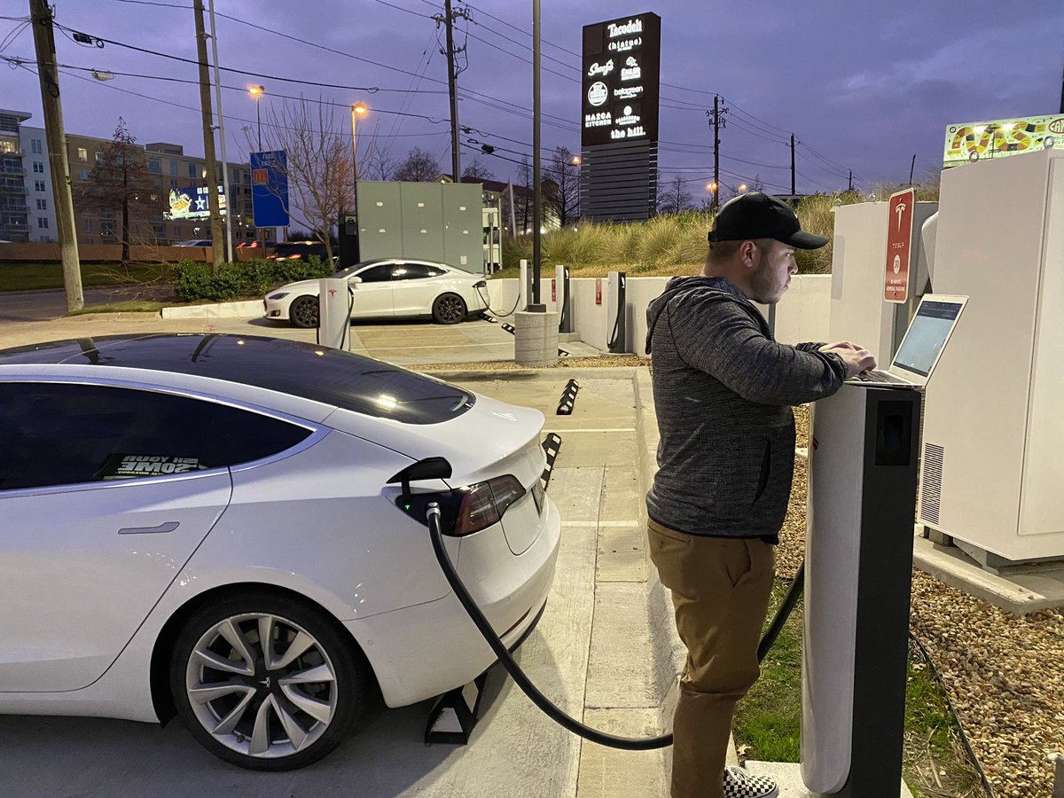 W2BRO's tweet photo. Showing a future owner the supercharger life, thanks for the standing desk @elonmusk fits the tech traveler lifestyle perfectly https://t.co/Z9mqtaAMkM