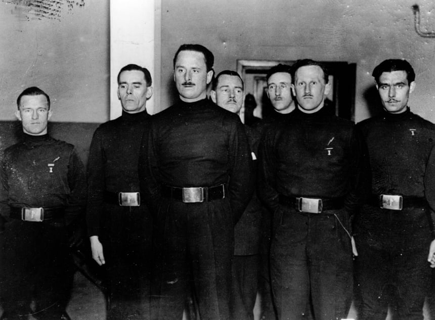 British fascism:Oswald Mosley, centre, with members of the British Union of Fascists, including William Joyrce – AKA Lord Haw-Haw – on the left.