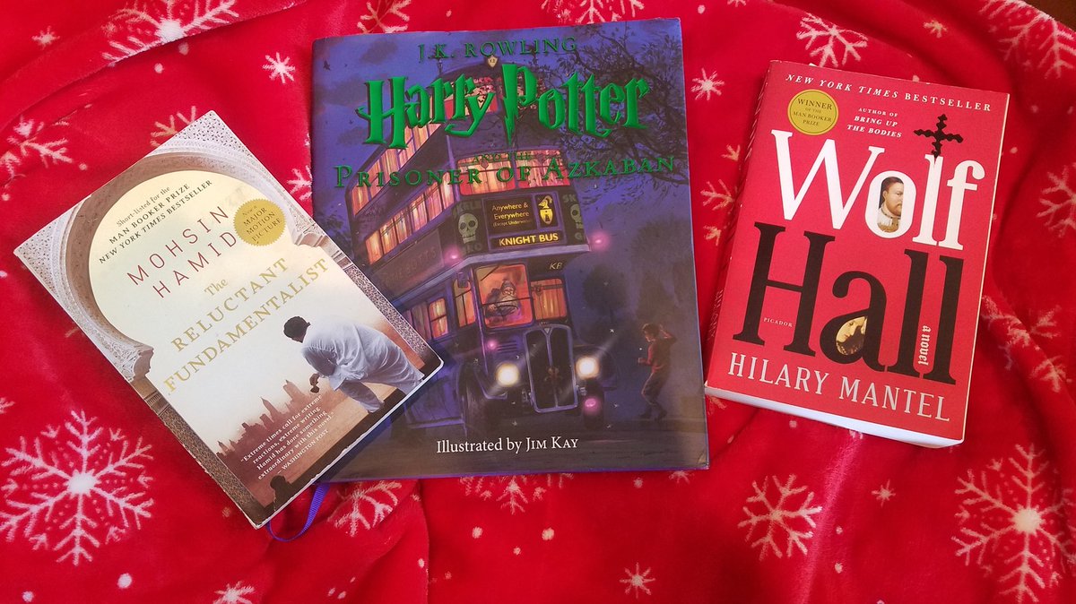JenLSabourin's tweet photo. One to finish (on the left), one to read aloud to the kids (middle), and one to start (on the left). #noviwinterbreak #NoviHolidayBreak https://t.co/9GFtaEslcH