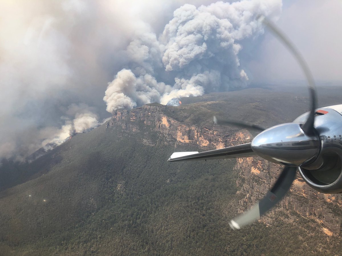 BLMFire's tweet photo. .@forestservice’s Matthew Petersen shares fire behavior views over the #GreenMountainFire in New South Wales, Australia. #NSWfires #AustraliaFires https://t.co/3fT0lGhFyn