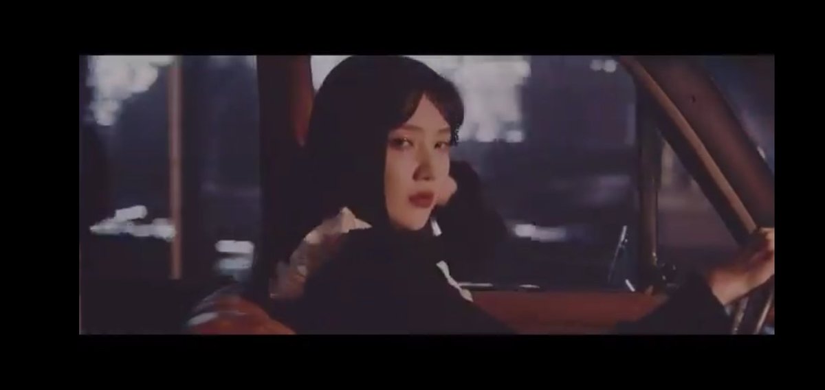 100.1. You can see here that Joy is sitting alone in the car, driving. From the early MVs of them, they are always together inside the car and it is Irene who is always driving. But once it is Wendy, now it is Joy alone. So what is happening here?