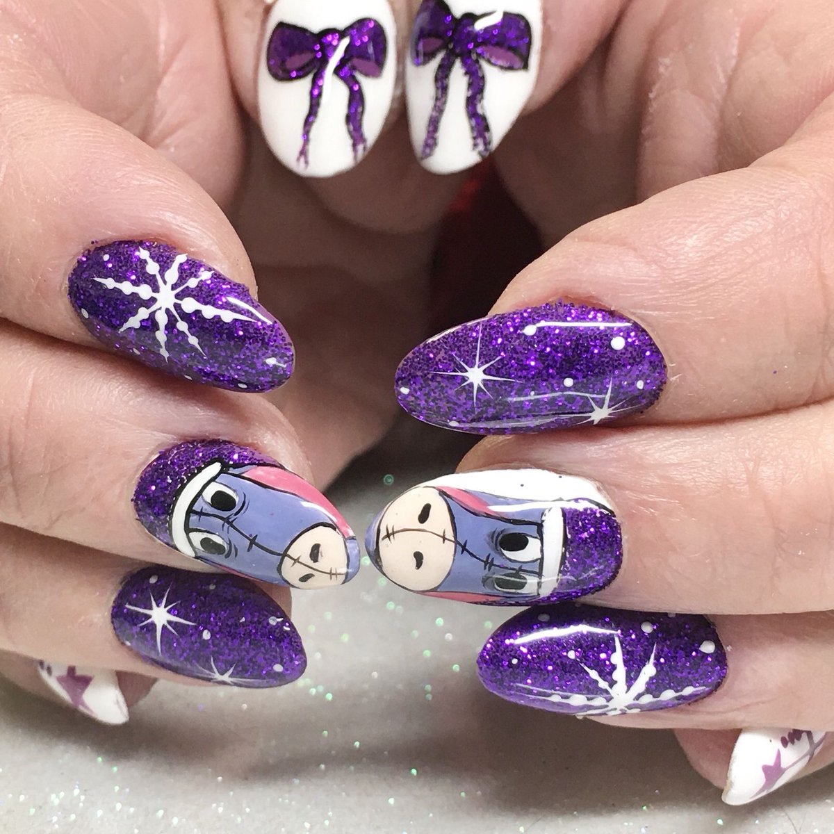 ElysiasHarmony's tweet photo. How about a purple eyesore for Christmas? Using @ikoniqnailsuk #polytek to infill and #primaolivia with glitter.  #christmasnails #purplenails #showscratch https://t.co/TYSzZzODVS
