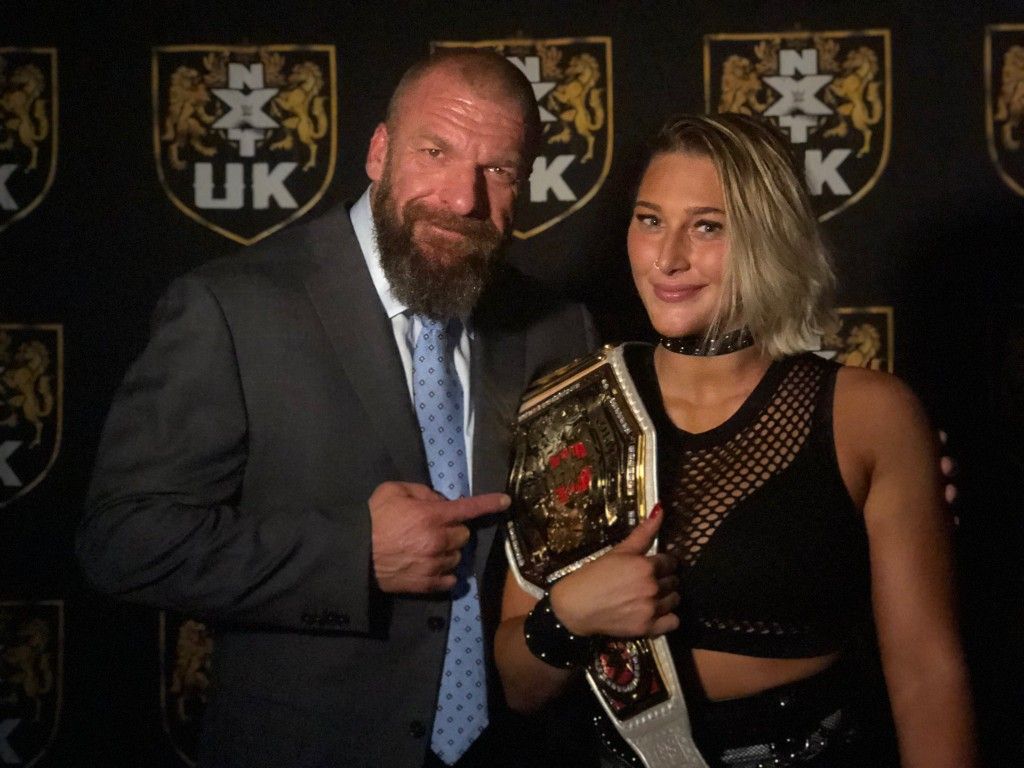 WWEWomen4ever's tweet photo. @RheaRipley_WWE @TripleH Nothing has change lol #RheaRipley #TripleH #WWE #WWENXT #NXTUK #NXT  Congrats Rhea First Women to win both the NXTUK Women's title &amp; NXT Women's title https://t.co/smz8pqXBNS