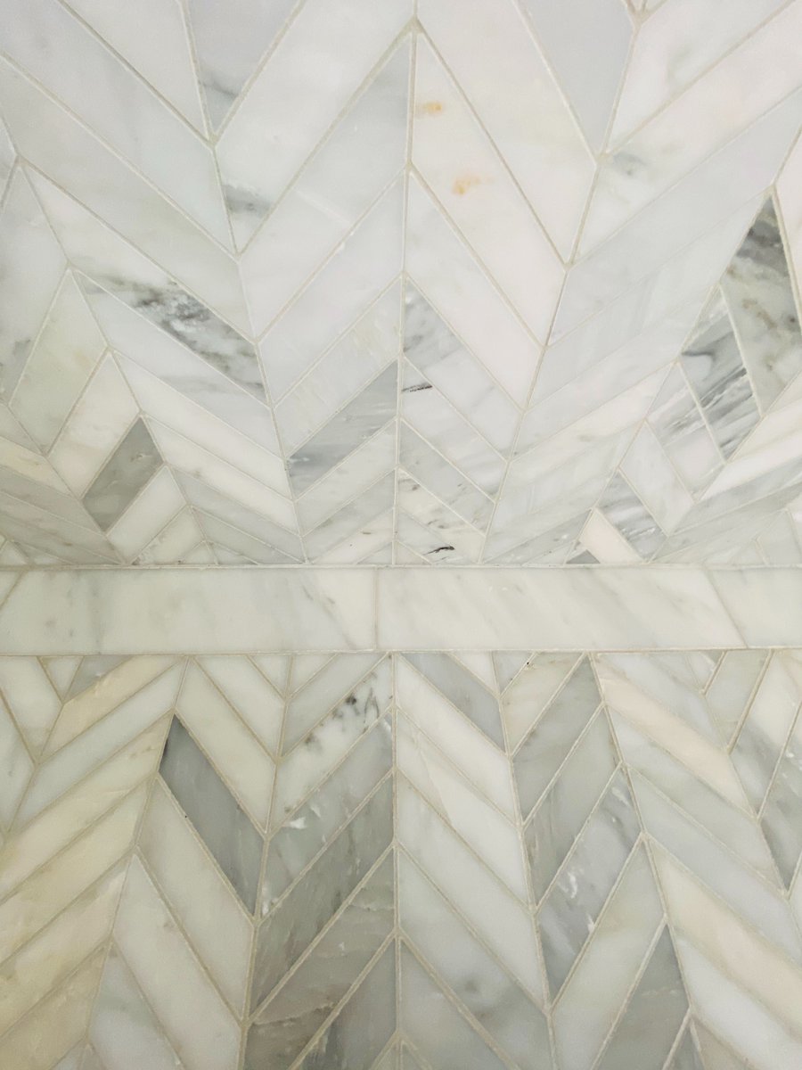 HGC_Designbuild's tweet image. Take a look inside our #baysideproject at the finished master bathroom… Are you loving this marble herringbone tile as much as we are?! It makes this bath timeless but always interesting.