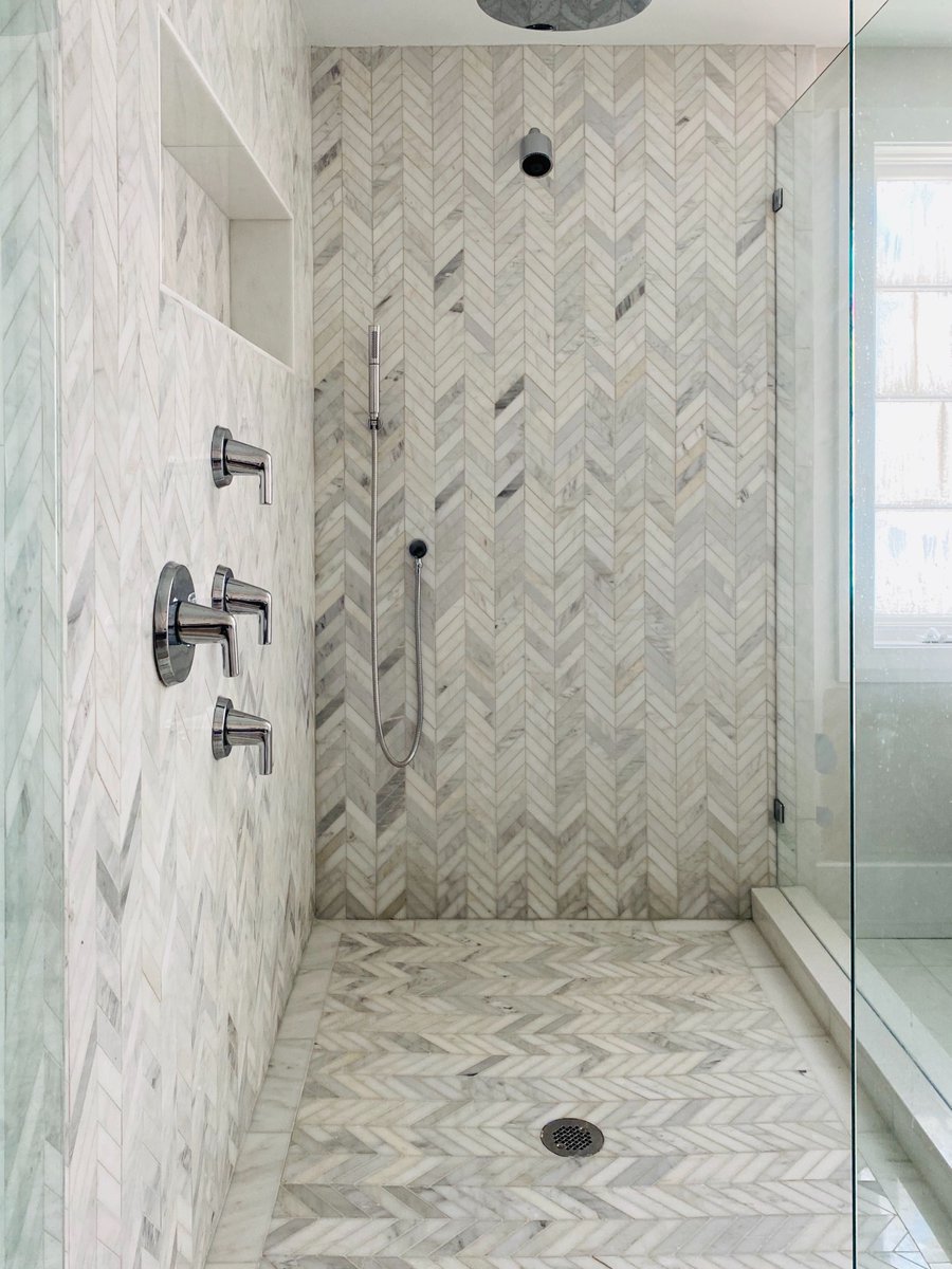 HGC_Designbuild's tweet image. Take a look inside our #baysideproject at the finished master bathroom… Are you loving this marble herringbone tile as much as we are?! It makes this bath timeless but always interesting.