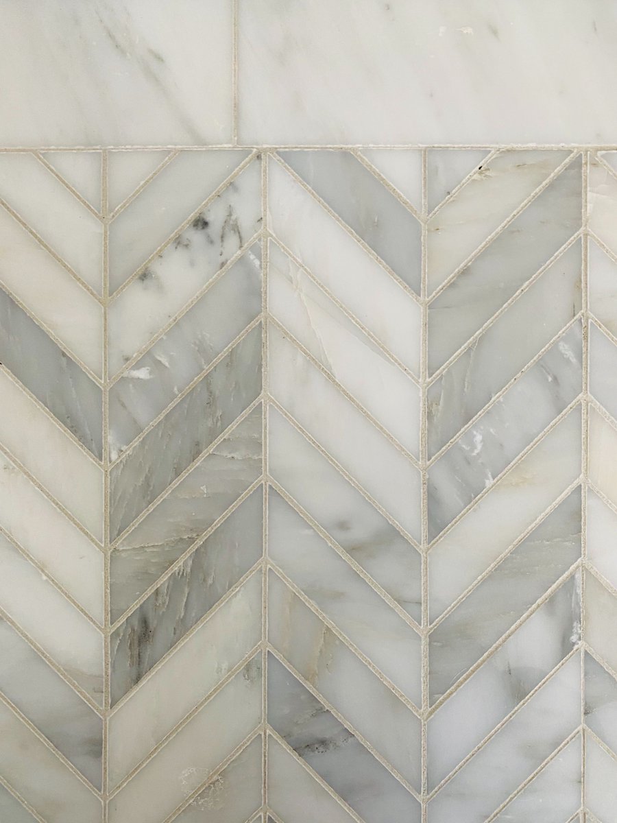 HGC_Designbuild's tweet image. Take a look inside our #baysideproject at the finished master bathroom… Are you loving this marble herringbone tile as much as we are?! It makes this bath timeless but always interesting.