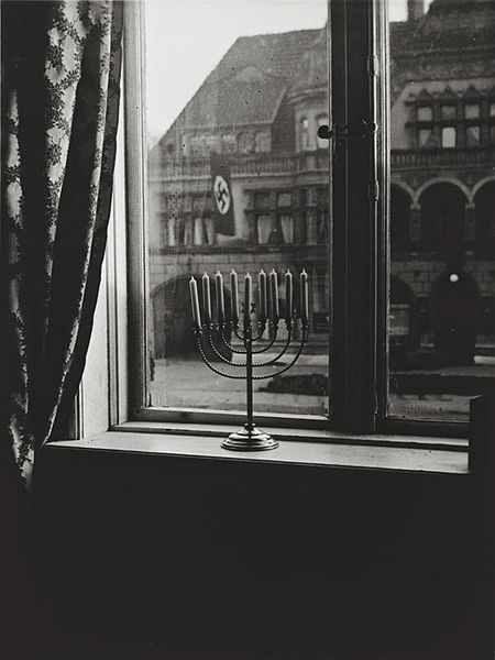 F_ZIHK's tweet photo. #Chanuka 5692 (1932 ) #Kilonia #Kiel
A photograph taken in 1932 by Rachel, wife of Rabbi Akiva Posner, of their candle-lit Hanukkah menorah against the backdrop of the Nazi flags flying from the building across from their home in Kiel Germany https://t.co/wbkDcrG0lp