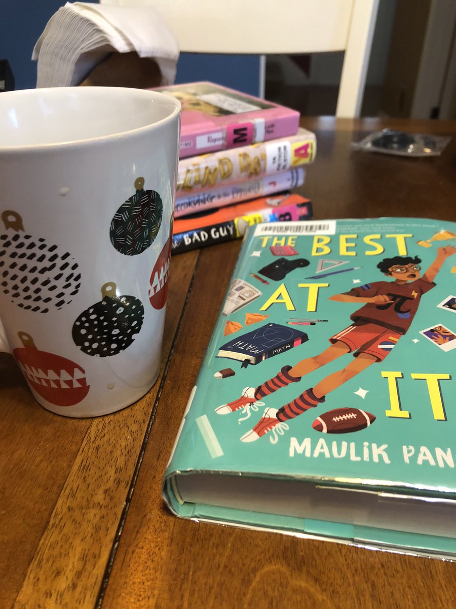 volibrary's tweet photo. #NoviHolidayBreak days 1 and 2 (oops!): my current read (and several more on deck ππ), and my favorite holiday decoration: our homemade Advent calendarπ https://t.co/6pNoEQ1uE0