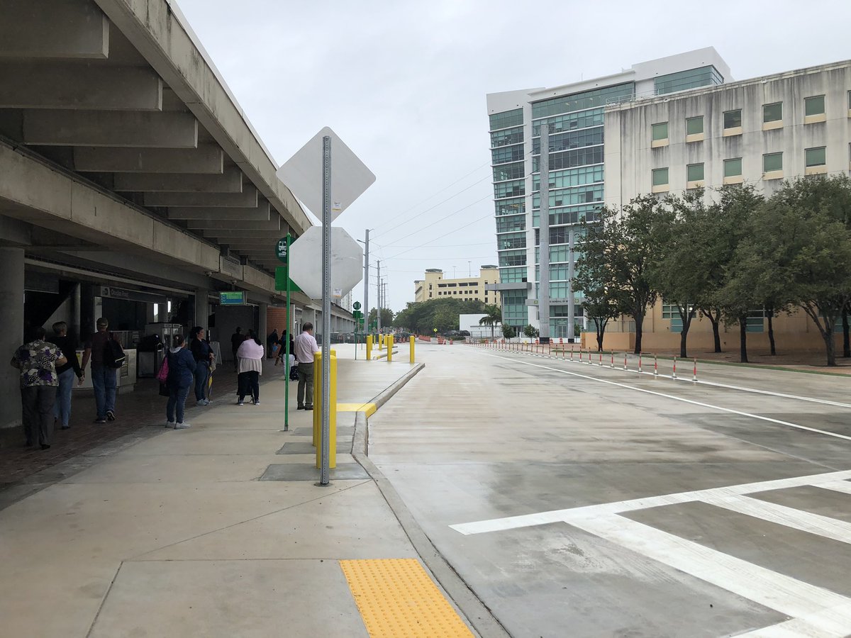 KennethJGarcia's tweet photo. The newly remodeled @IRideMDT drop off drive in front of Douglas Road Station is now open. Looks like a big downgrade for people, bikes, public space, and @theunderlinemia. Why are we going backwards? @TransitMIA @BikeWalkCG https://t.co/N7kTK4g9mp