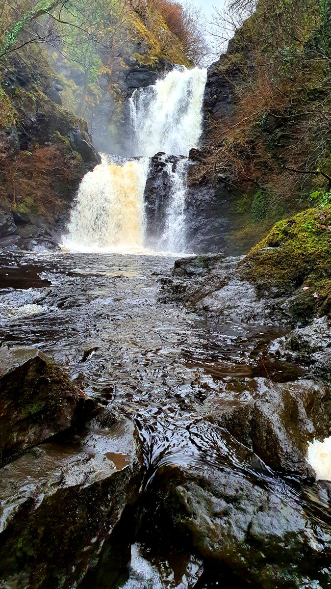 Our stroll this lunchtime took us to the beautiful double waterfall of Rha Falls at Uig. Tinged yellow by the surrounding peat &amp; recent rainfall. #Skye #Scotland #ScotlandIsNow