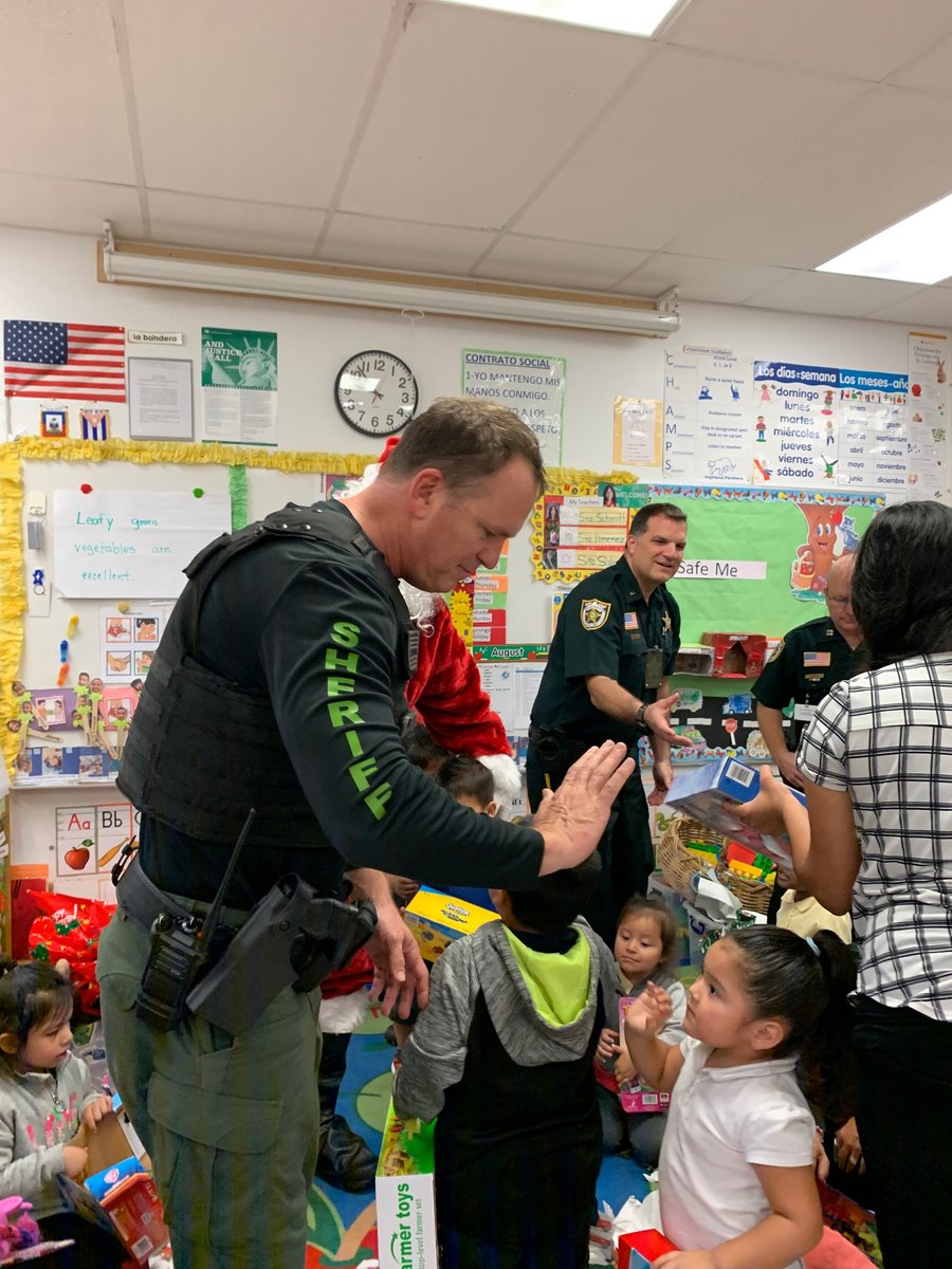 The moment you realize not all kids run to Santa. Shout out to this little one for giving us her undivided attention. 😊👌🏼