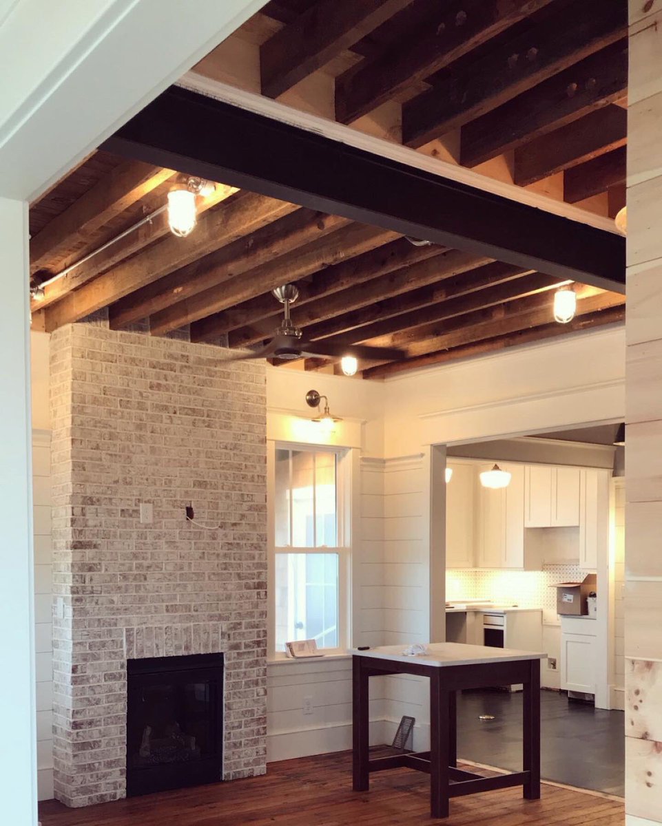 CCCOBX's tweet photo. #GrayGhost Cottage. Check out all that character in the wood floors where the horses used to walk, back when this was the barn for the life saving station. What a beautiful home with such a significant history. #obxbuilder #refinishedfloors #remodel #exposedjoists #thinbrick https://t.co/gyzUCwuQMt