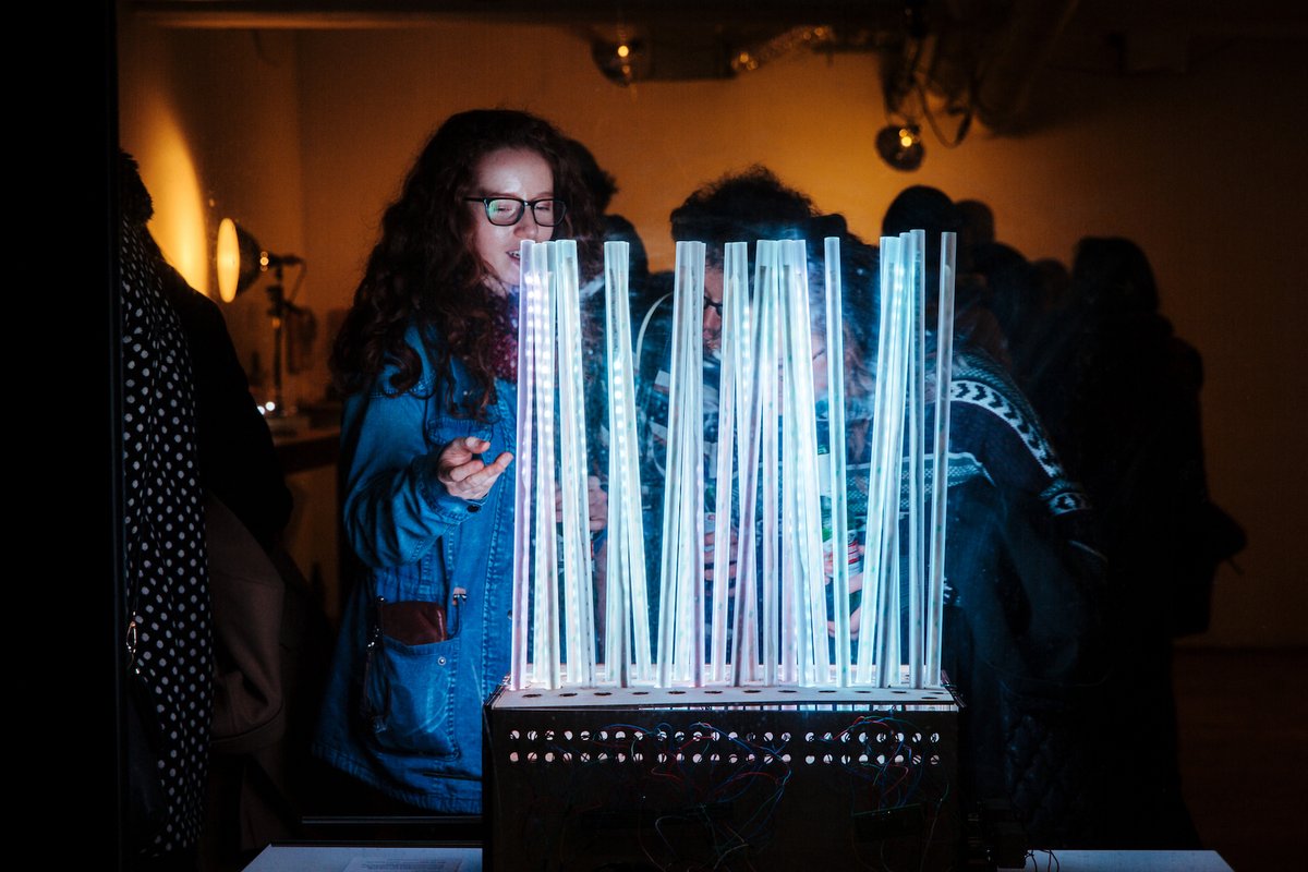 Bright blue LED installation in SFPC space. Lights in plastic clear tubes. Audience interaction.

