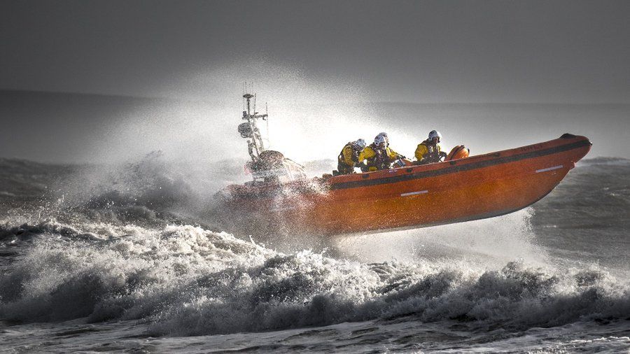 StormHour's tweet photo. Riders of the storm: Porthcawl @RNLI lifeboat volunteers in action as Storm Atiyah hits the UK - by @watchandshoot ~ "BOTR" Weather Photo Of The Week 23rd December 2019 - https://t.co/4y8fNJslYq #stormatiyah #StormHour https://t.co/X7iksQJ9c8