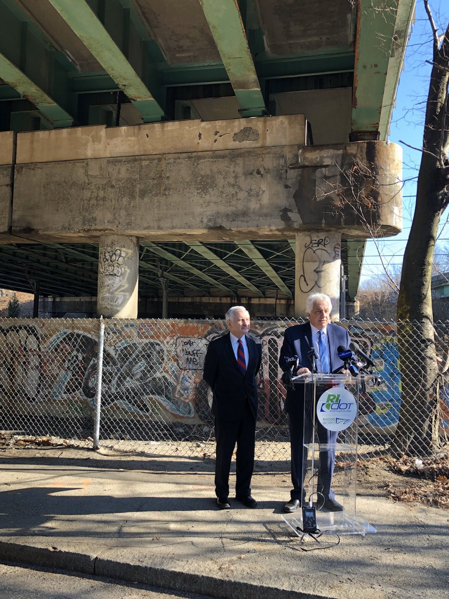 NewsProvidence's tweet photo. .@SenJackReed and @RIDOTNews Director @PeterAlviti stand beneath an overpass in Cranston as Sen. Reed announces an additional $50 million for #RhodeWorks road and bridge construction in #RI. -SK #WPRO https://t.co/36BEHa1CJT