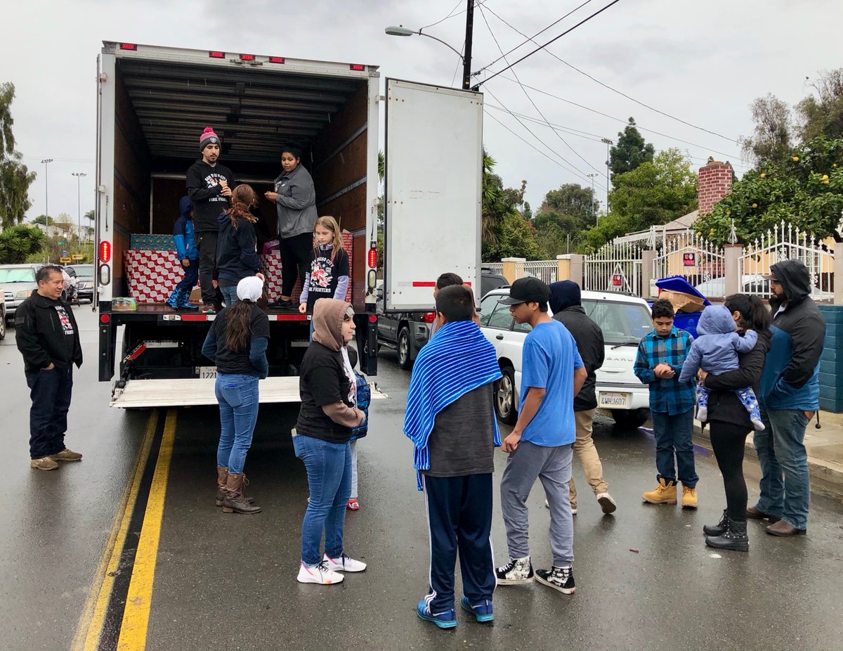 SDLocal145's tweet photo. The rain hasnโt dampened the spirit of your San Diego City Firefighters! A 30 year tradition of giving back to the community. #mobilesanta #Local145 #sdfd https://t.co/t7TqOIyoct