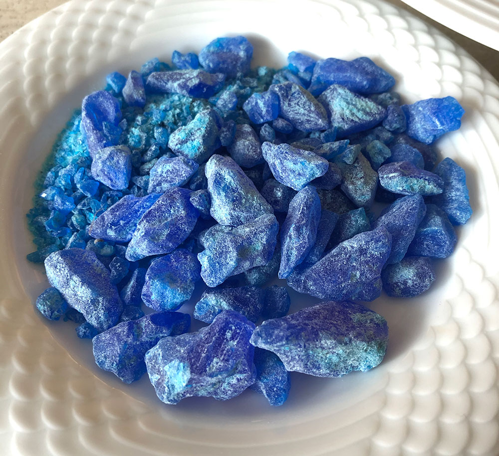 Since I just mentioned alum, now's a good time to introduce so-called "blue alum" شبة ازرق which I fortuitously discovered in the spice market. The name is misleading as it's actually copper sulfate زاج أزرق .  @CellardEleonore discovered the presence of copper in the