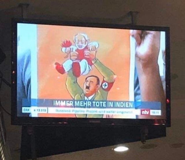dhruv_rathee's tweet photo. German TV Channel shows a poster with Modi and Hitler together 

Modi has been destroying his own international reputation thanks to his nonsense decisions. There is still time, fall back on CAA-NRC, otherwise world will remember you like this 👇 https://t.co/7lKWTuNQ3K