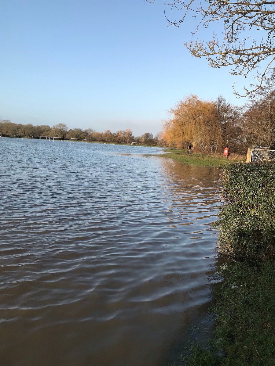 TMBC_Kent's tweet photo. Now we have a drier spell the river water levels in Tonbridge have receded. Whilst you're out and about over the Christmas period, please remember that  there still remains significant levels of standing water at the Racecourse Sportsground so please take care around the area. https://t.co/iqf6ezt5PM