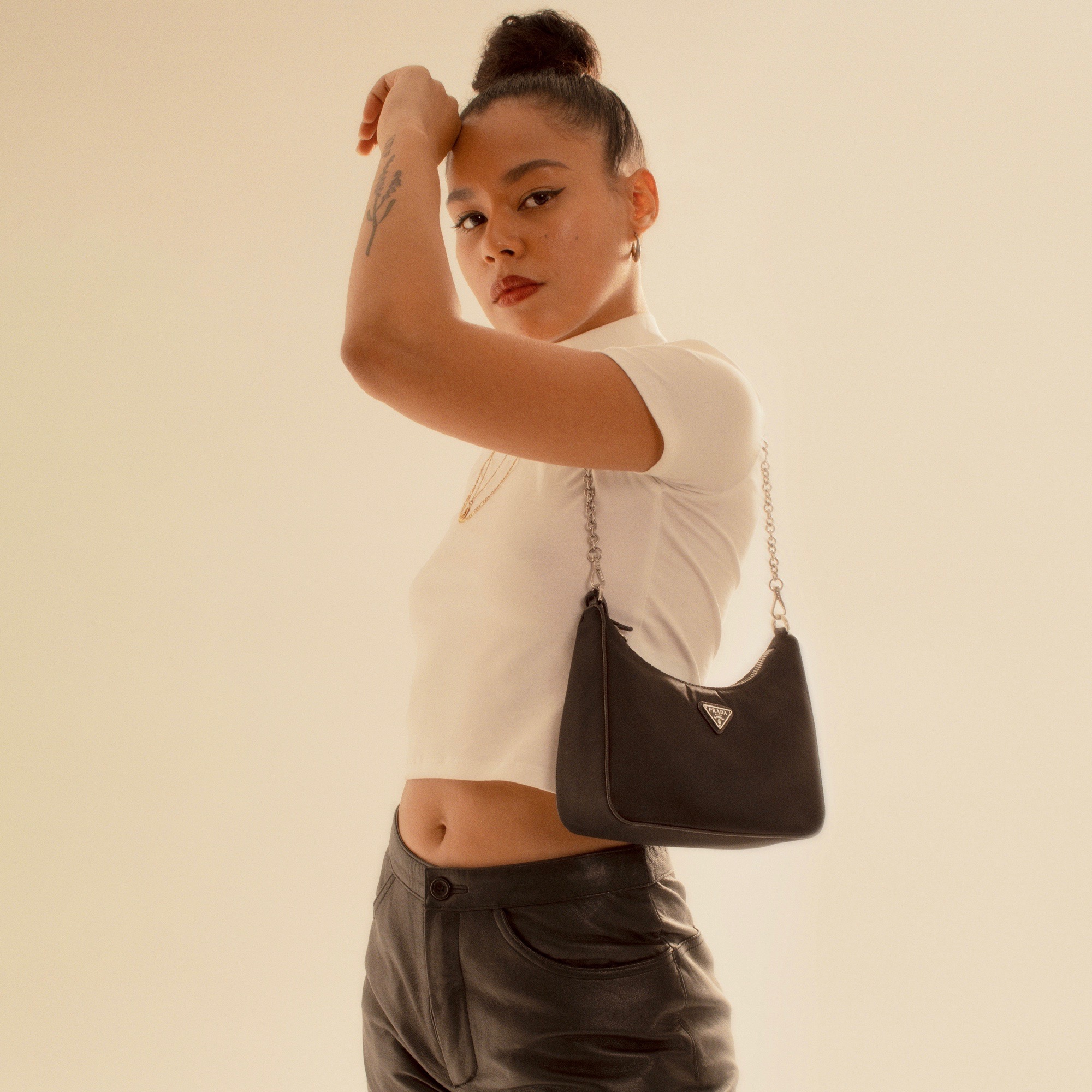 StockX on X: A trendy take on a classic shape 🖤 Prada's Re-Edition bag  finds a balance between the micro, bumbag, and crossbody obsessions. Shop  the Prada Re-Edition Nylon Bag on StockX