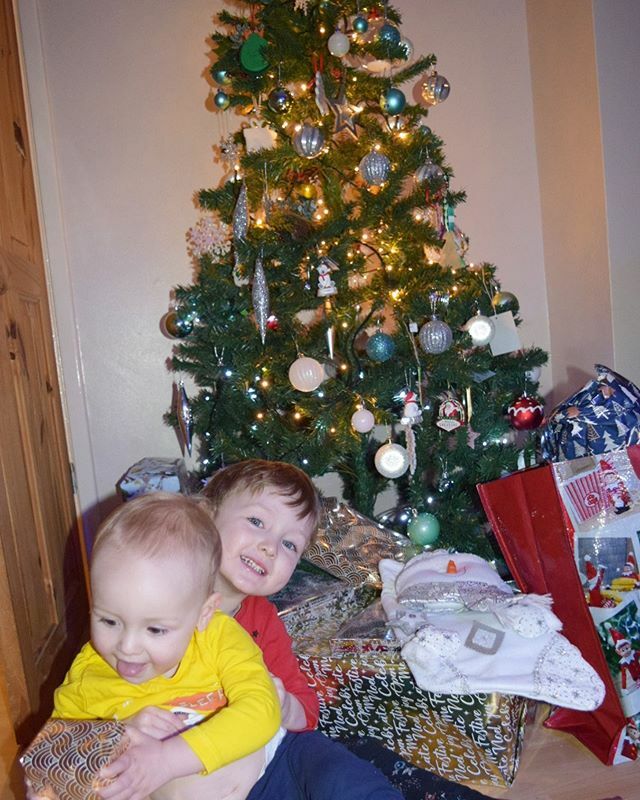 Attempted a photo under the tree... Dylan tried to run off with a present while Ethan tried to stop him.... Merry Christmas! 🎄🎄🎄 ift.tt/2PU8dHe