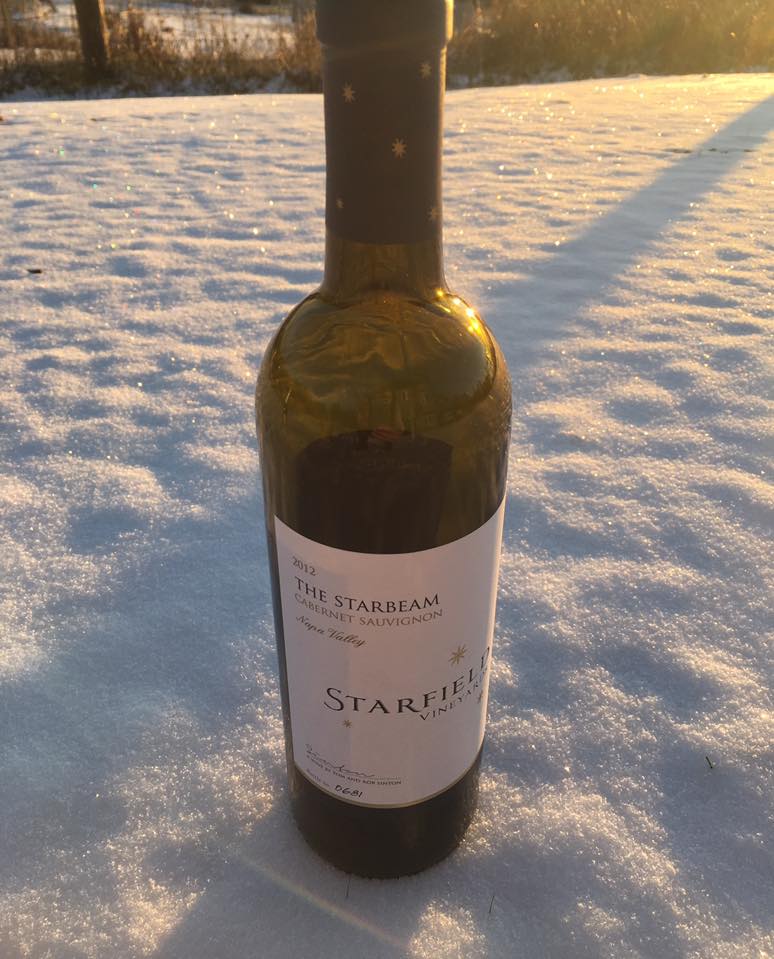Add a bold red wine to warm up your snowy holidays! #starfieldvineyards #snow #holidays #wine #winter #holidaywine #travel #whitechristmas #wine #cabernet #placerville #ski #applehill