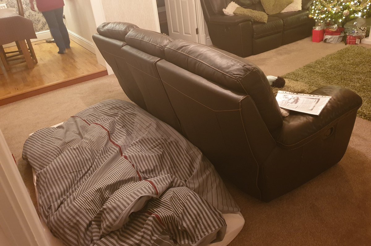 SkeletonOscar's tweet photo. @rhodri Foam mattress on the floor in my mum's living room because my brother is staying and I am being chivalrous by giving up my bed for him for the night. "Put the mattress that side of the sofa and you'll have more privacy" apparently. ๐ฌ #DuvetKnowItsChristmas https://t.co/3uIJMUc5Rb