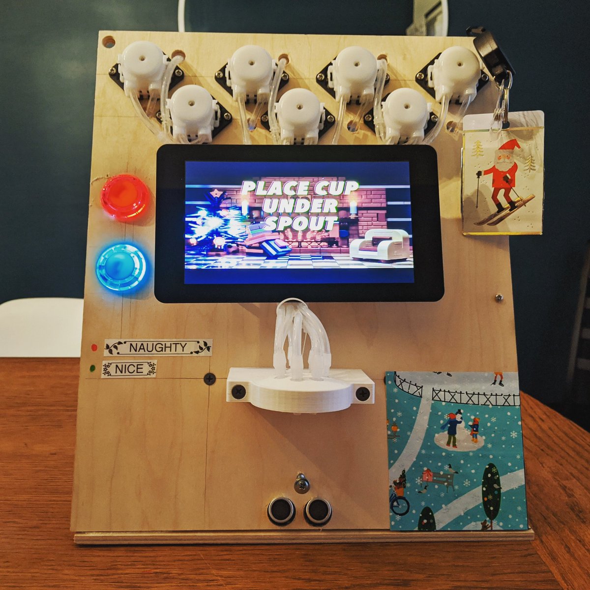 makerprojectlab's tweet photo. The *Holiday Edition* of my cocktail robot project is working and ready to party! Inside is an RFID scanner, an ultrasonic sensor for cup detection, and a full @hellodrinkbot build.
π₯π€π
#cocktailrobotics
#hohoho
#makersgonnamake https://t.co/qr407kgxbL