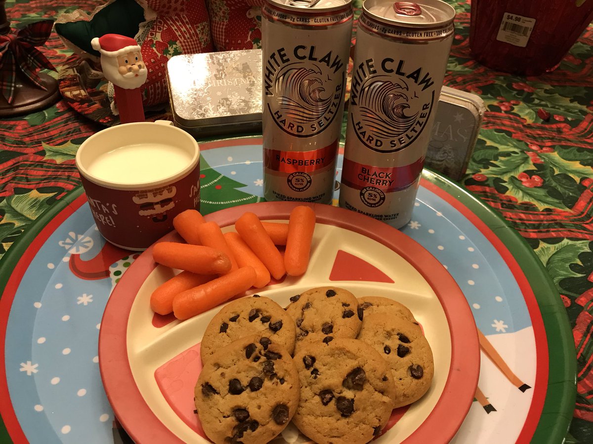 ricklow80's tweet photo. #christmas time. #cookies and #milk for #santaclaus on his voyage, the #reindeer all get #carrots. And something for #mrandmrsclaus after he’s done his thing for all the good boys and girls. A little #whiteclaw to chill w. #merrychristmas @whiteclaw #clawsforclaus #claws4claus https://t.co/mzJwUZNCmU
