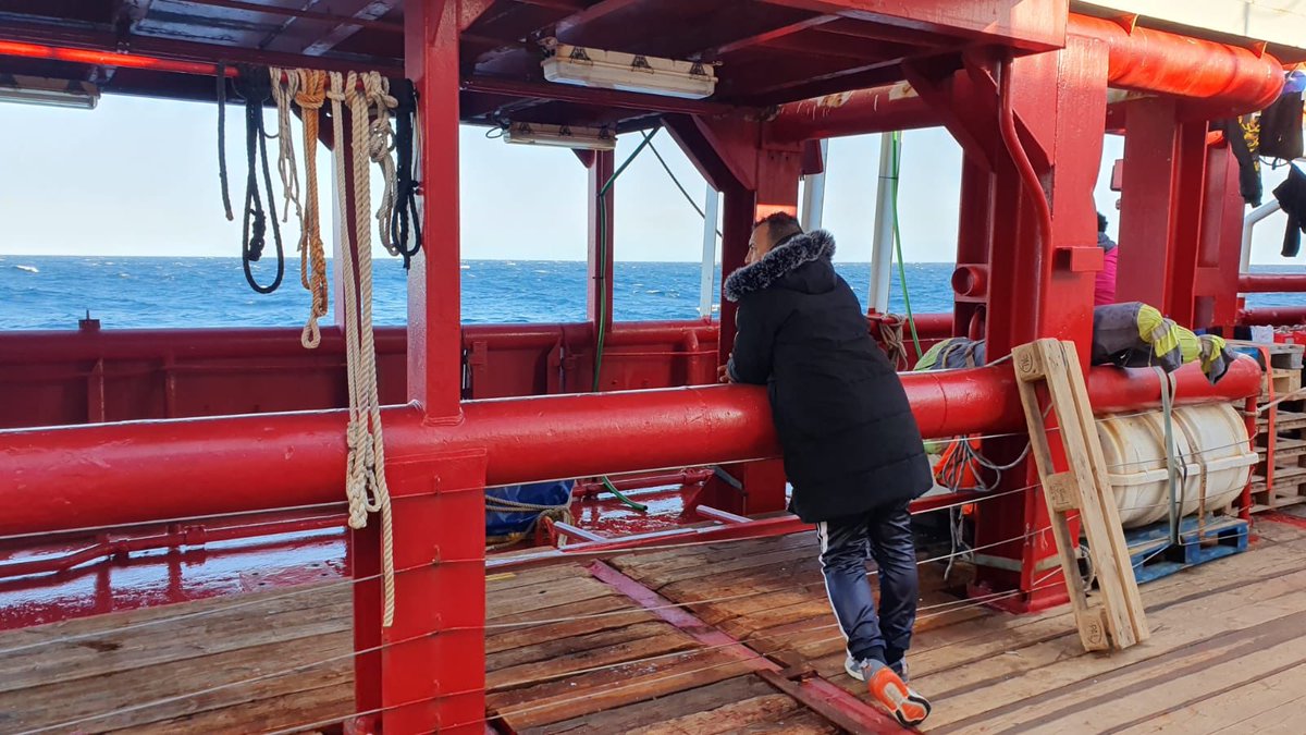 On main deck of #OceanViking there's always someone lost in thought &amp; staring out to sea. For some people I talked to, this was their 4th attempt to cross the Med. Each time before, they were intercepted by the Libyan coastguard &amp; returned to a hellish detention centre