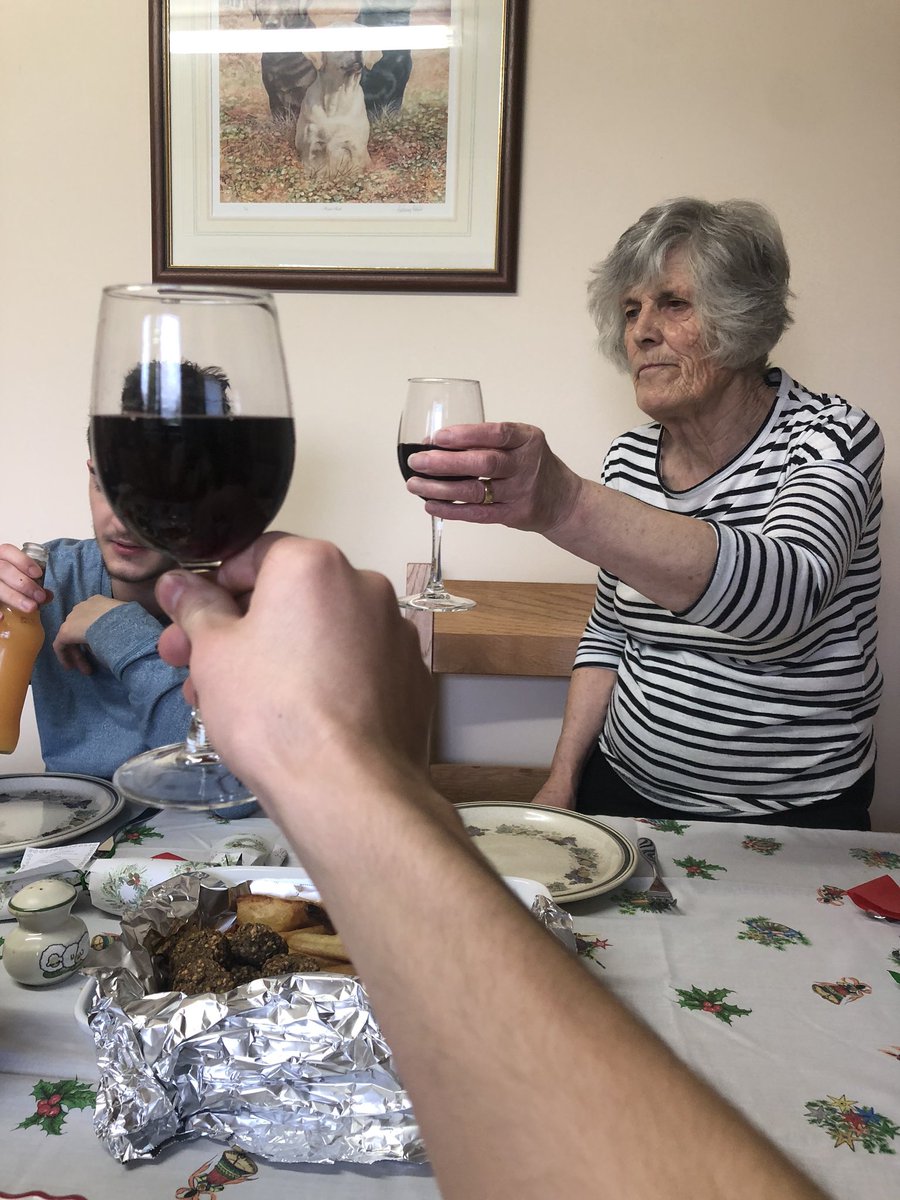Raising a glass to the empty chair