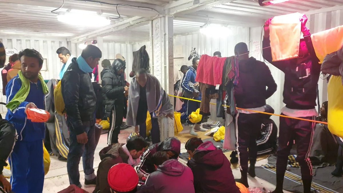 People gather their few possessions ahead of landing in Italy. Lots of smiles but lots of trepidation too. A middle-aged Moroccan man is weeping. Mohammed, from Darfur in Sudan, says he feels sad to leave #OceanViking - "Here I feel safe," he says.