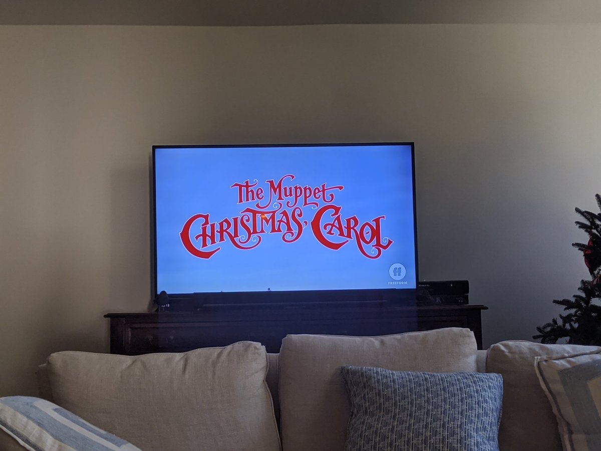 Television showing the title card for "The Muppet Christmas Carol"