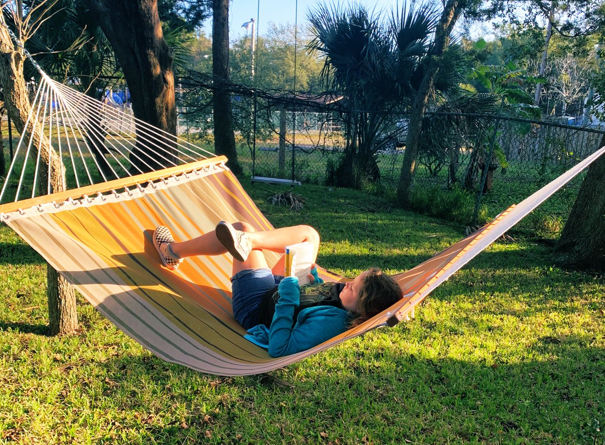 thejennpac's tweet photo. On Christmas morning, nothing better than a new book and a hammock. Thanks @JP_Books for writing kids books my daughter can’t put down. https://t.co/rkyciU0zrV