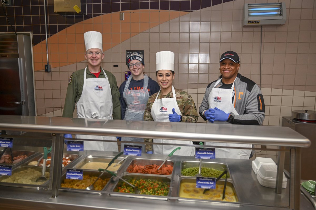 HollomanAFB's tweet photo. The weather outside isn't necessarily frightful, but inside the Shifting Sands Dining Facility it sure is delightful! We even had a special visit from #SantaClaus. #49Wing commanders, command chiefs, first sergeants and volunteers are hard at work serving up lunch for visitors. https://t.co/WhGjgTalQk