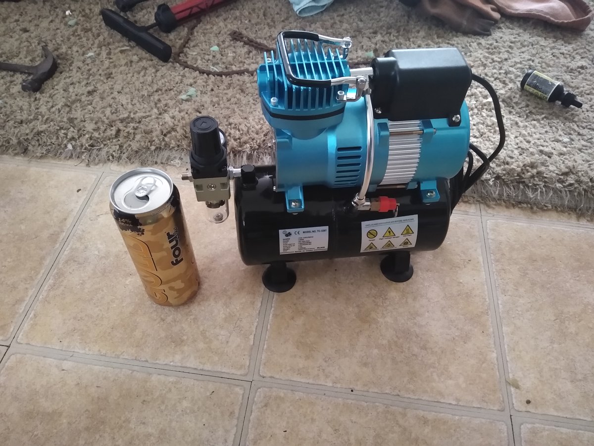 Bf got me a air brush kit setup, now i don't have to use this really ghetto air can i glued a valve stem from a used tire into anymore as my ghetto airbrush system. Merry Christmas and happy holidays to all!