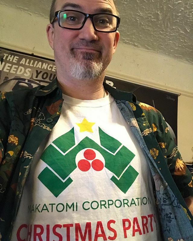 petenicholls_'s tweet photo. Time for one last #ChristmasTradition in our home—time to go to the #NakatomiChristmasParty!! I’ve got my shirt on and the #4Kversion is queued up on the #AppleTV! #YippieKaiYayMamaJamma! https://t.co/FPbBGE5wkg https://t.co/shi1Ktx4RV