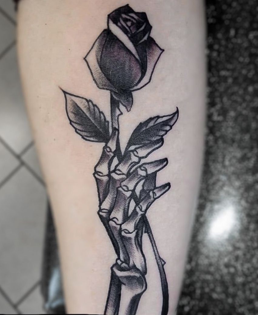 black rose tattoo hand