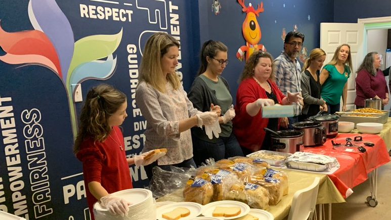 choicesforyouth's tweet photo. Our EESE team hosted their holiday celebration on Friday with help from @NalcorEnergy and a delicious donation @NalcorEnergy 🍗 🍟 The big man in red even stopped by... and he looked suspiciously like one of our team members, Rory 🤔 😂 🎅 Happy Holidays from EESE! #GiveHome https://t.co/4eOcKqE5DI