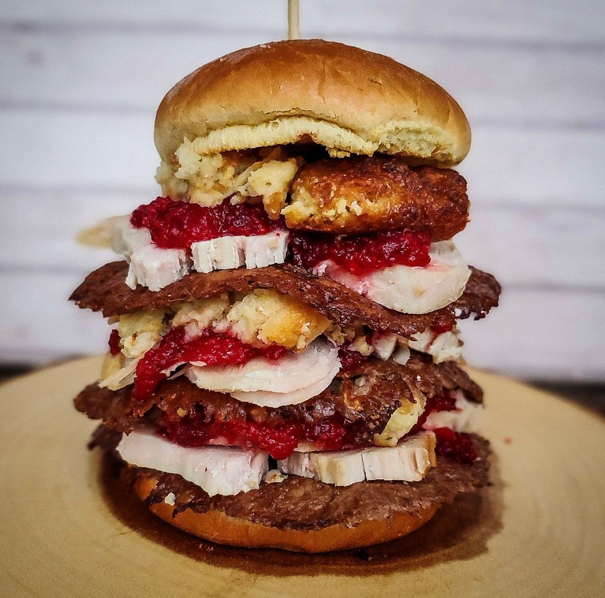 WhatsyourBeefBu's tweet photo. Here's a good idea for the leftovers - pile it on a massive burger. Three layers of beef, turkey, stuffing and cranberry sauce on this one from @farmer_the_foodie . Champion.
#boxingday #xmasburger #christmasburger #turkeyburger #leftovers #boxingdayfood https://t.co/5Dq3ZSJsTf